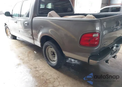 2002 Ford F-150 Lariat/Xlt z USA, uszkodzony, nr VIN 1FTRW07652KB35711